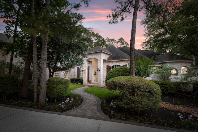 63 N Wooded Brook Cir, The Woodlands, TX 77382 - view of french country inspired facade