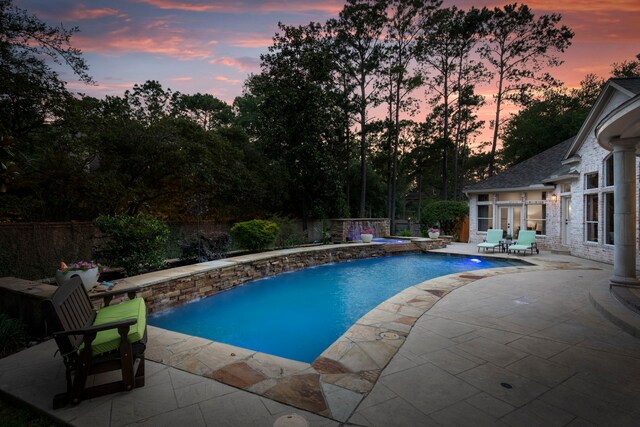 63 N Wooded Brook Cir, The Woodlands, TX 77382 - view of pool with a patio area and a fenced backyard