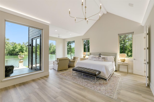 18 N Smith Loop N, Cleveland, TX 77327 - bedroom featuring beamed ceiling, light wood-style floors, a chandelier, high vaulted ceiling, and recessed lighting