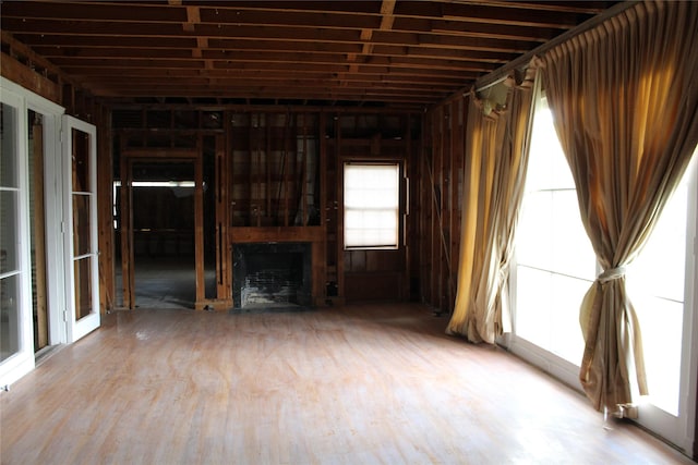 3603 Rio Vista St, Houston, TX 77021 - unfurnished living room with wood finished floors and a fireplace