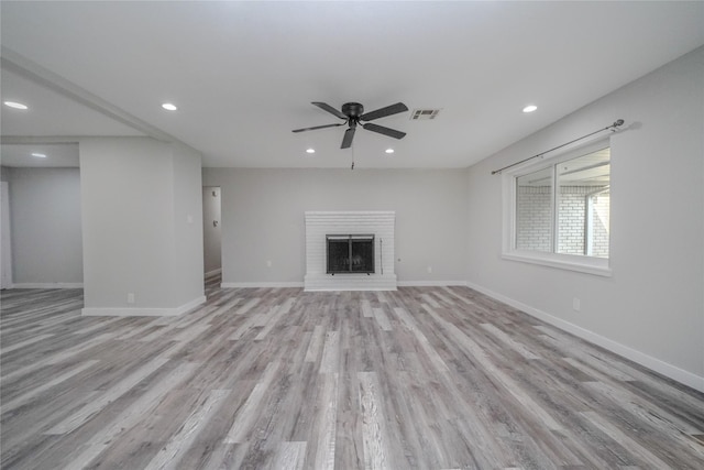 5915 Valkeith Dr, Houston, TX 77096 - unfurnished living room featuring wood finished floors, recessed lighting, ceiling fan, a fireplace, and baseboards