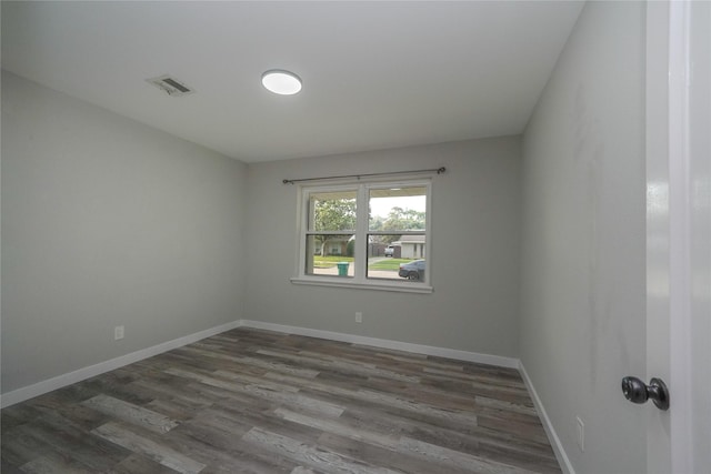 5915 Valkeith Dr, Houston, TX 77096 - spare room with dark wood finished floors and baseboards