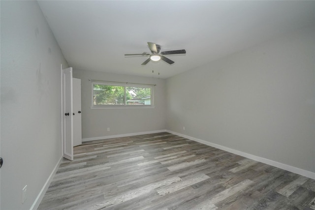 5915 Valkeith Dr, Houston, TX 77096 - unfurnished room with a ceiling fan, wood finished floors, and baseboards