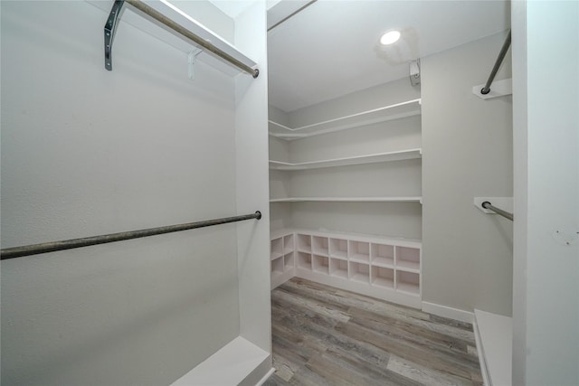 5915 Valkeith Dr, Houston, TX 77096 - walk in closet with wood finished floors