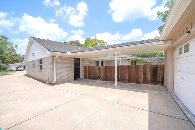 5915 Valkeith Dr, Houston, TX 77096 - view of home's exterior with brick siding, driveway, and a garage