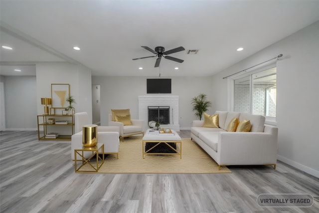 5915 Valkeith Dr, Houston, TX 77096 - living area with a ceiling fan, wood finished floors, a fireplace, and recessed lighting