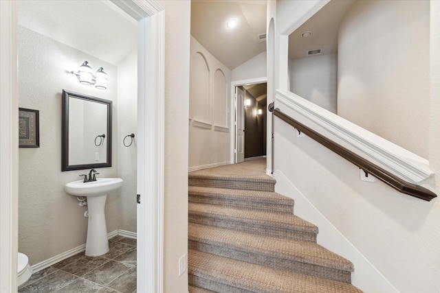 34132 Willow Bluff Ln, Pinehurst, TX 77362 - stairs with lofted ceiling and baseboards