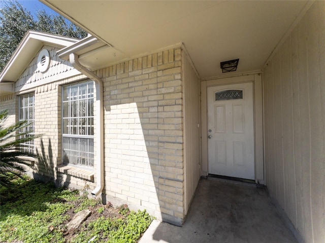 2907 Helmsley Dr, Pearland, TX 77584 - doorway to property featuring brick siding