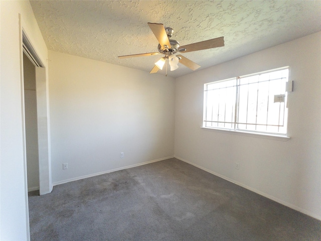 2907 Helmsley Dr, Pearland, TX 77584 - carpeted spare room featuring a ceiling fan, a textured ceiling, and baseboards