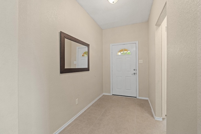 9226 Birch Springs Dr, Houston, TX 77095 - doorway to outside with baseboards and light tile patterned flooring