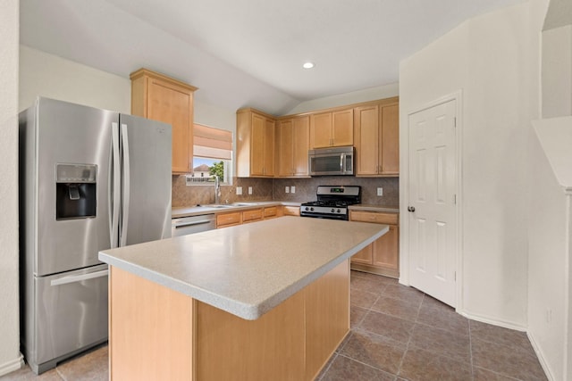 9226 Birch Springs Dr, Houston, TX 77095 - kitchen with stainless steel appliances, a sink, decorative backsplash, light countertops, and a center island