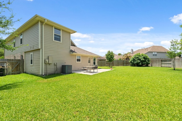 9226 Birch Springs Dr, Houston, TX 77095 - back of house with central AC and a patio area