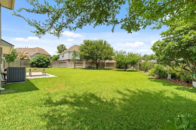 9226 Birch Springs Dr, Houston, TX 77095 - view of yard with central AC and a patio