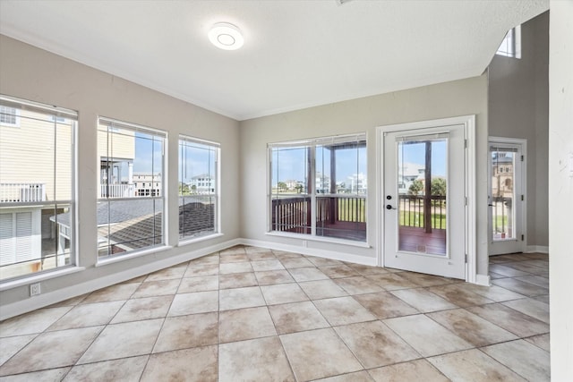 21 Fleming, Hitchcock, TX 77563 - unfurnished sunroom with healthy amount of natural light