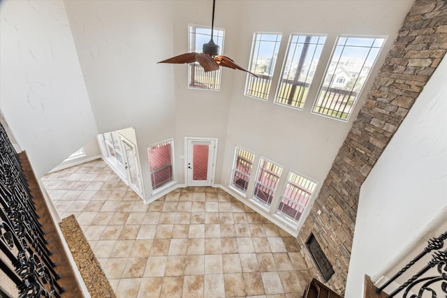 21 Fleming, Hitchcock, TX 77563 - entrance foyer featuring healthy amount of natural light, a towering ceiling, ceiling fan, and light tile patterned floors
