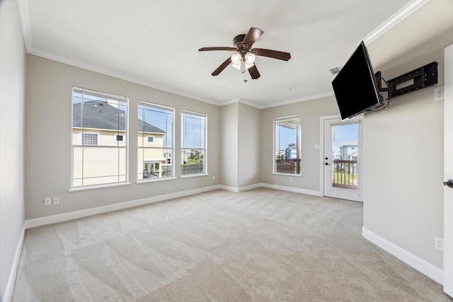 21 Fleming, Hitchcock, TX 77563 - spare room with carpet flooring, ornamental molding, plenty of natural light, and ceiling fan