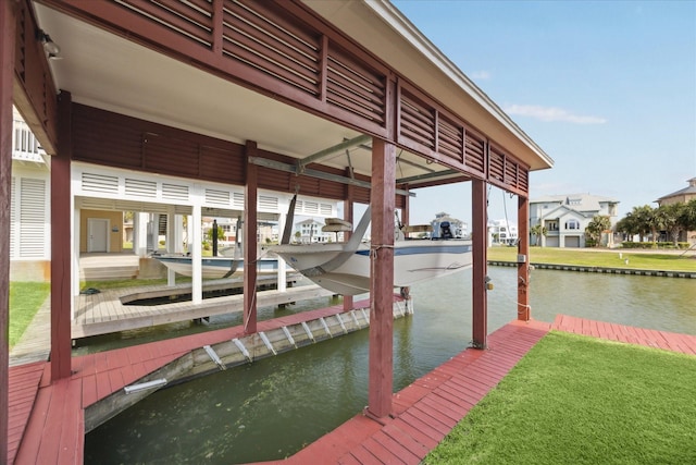 21 Fleming, Hitchcock, TX 77563 - dock area featuring boat lift and a water view