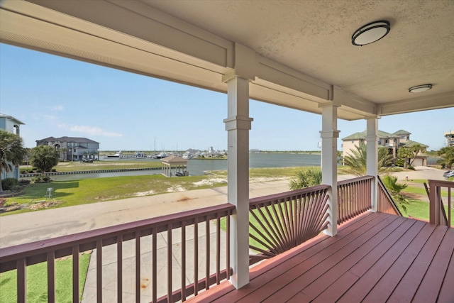 21 Fleming, Hitchcock, TX 77563 - porch with a water view and a yard
