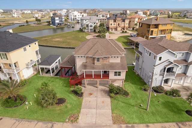 21 Fleming, Hitchcock, TX 77563 - aerial perspective of suburban area featuring a large body of water