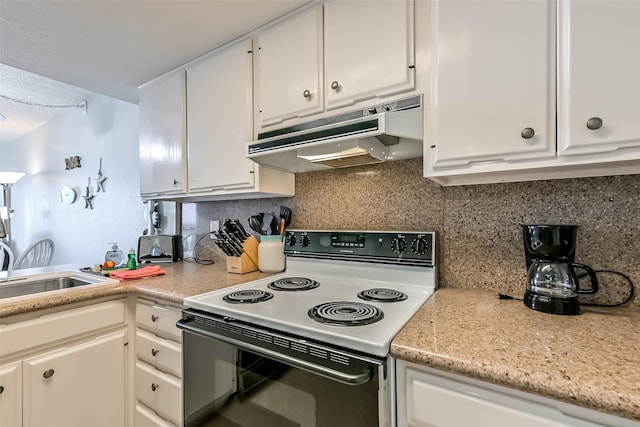 7310 Seawall Blvd Unit 907, Galveston, TX 77551 - kitchen featuring electric range, under cabinet range hood, light countertops, white cabinets, and a sink