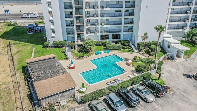 7310 Seawall Blvd Unit 907, Galveston, TX 77551 - bird's eye view of a pool and apartment complex / building