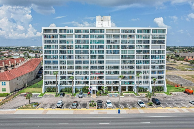 7310 Seawall Blvd Unit 907, Galveston, TX 77551 - view of apartment building / complex with uncovered parking