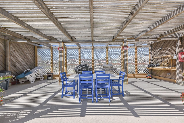 7310 Seawall Blvd Unit 907, Galveston, TX 77551 - view of patio / terrace featuring a pergola and outdoor dining area