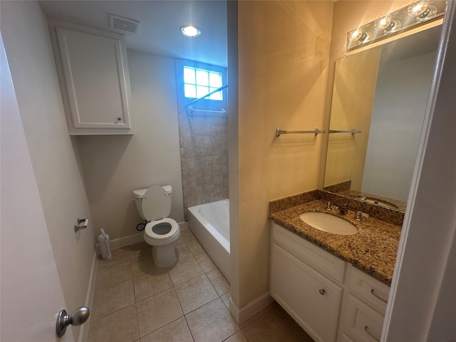 8710 Beverlyhill St Unit 102, Houston, TX 77063 - full bathroom with toilet, vanity, tile patterned flooring, and baseboards
