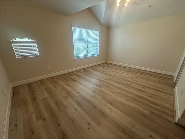 8710 Beverlyhill St Unit 102, Houston, TX 77063 - unfurnished room featuring light wood-type flooring, ceiling fan, vaulted ceiling, and baseboards