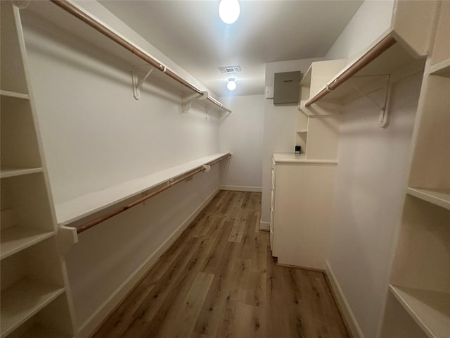 8710 Beverlyhill St Unit 102, Houston, TX 77063 - walk in closet featuring light wood-style floors