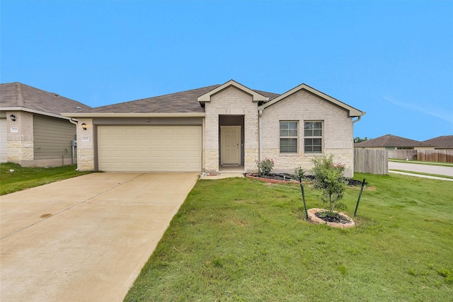 127 Barton Creek Dr, Huntsville, TX 77340 - ranch-style house with an attached garage, driveway, and brick siding