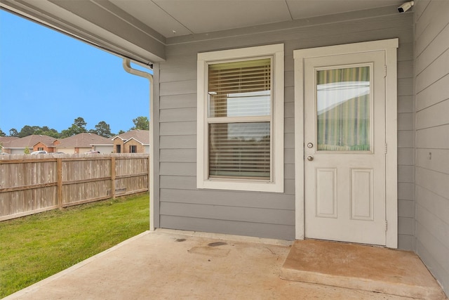 127 Barton Creek Dr, Huntsville, TX 77340 - view of exterior entry featuring a patio