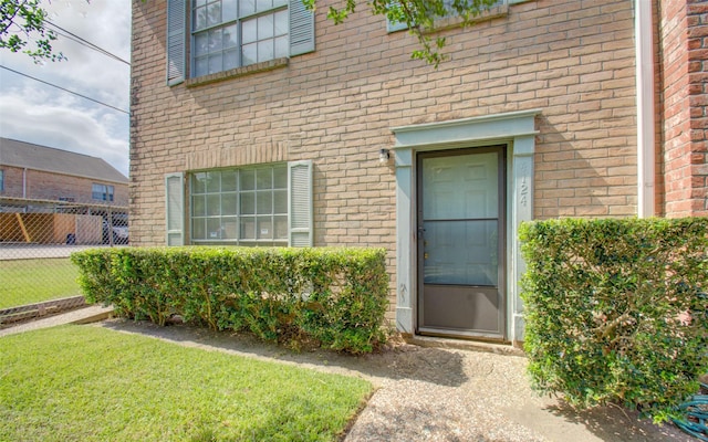 4124 Belle Park Dr, Houston, TX 77072 - view of exterior entry featuring brick siding