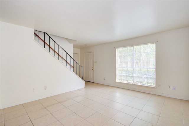 4124 Belle Park Dr, Houston, TX 77072 - unfurnished living room featuring stairs and light tile patterned floors