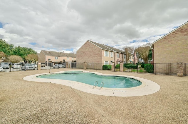4124 Belle Park Dr, Houston, TX 77072 - community pool featuring a patio area