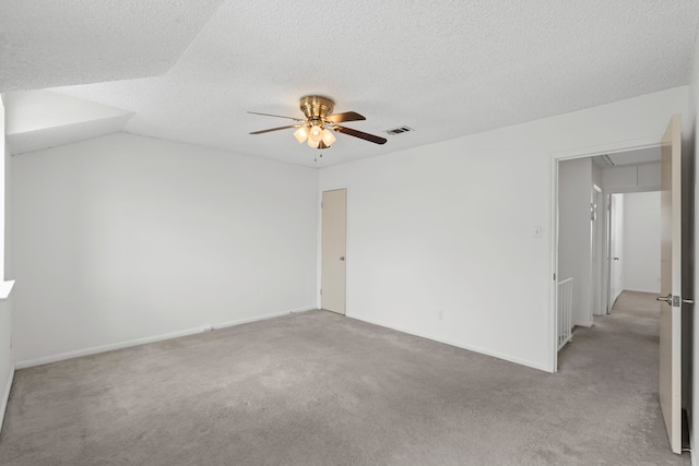 10320 Hammerly Blvd Unit 171, Houston, TX 77043 - unfurnished room featuring attic access, light carpet, a ceiling fan, baseboards, and a textured ceiling