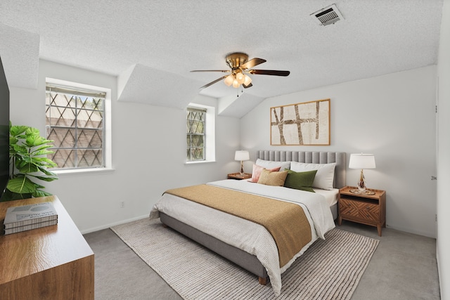 10320 Hammerly Blvd Unit 171, Houston, TX 77043 - bedroom with carpet floors, a textured ceiling, a ceiling fan, and baseboards
