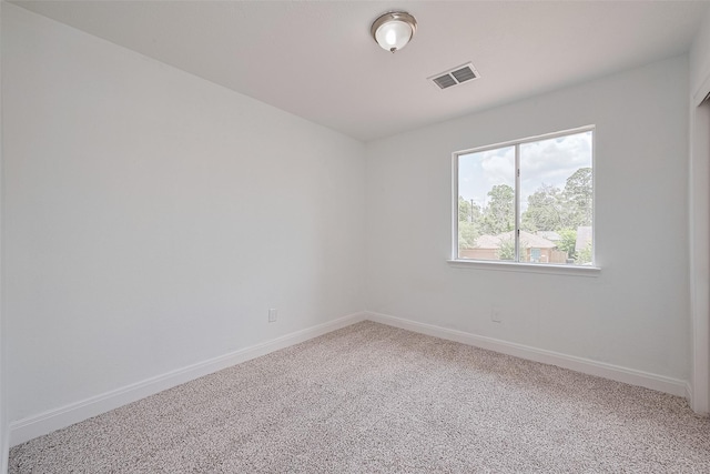 24214 Soft Pine Dr, Huffman, TX 77336 - carpeted empty room with baseboards