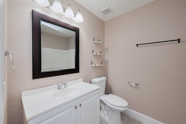 24214 Soft Pine Dr, Huffman, TX 77336 - bathroom featuring vanity, tile patterned floors, and toilet