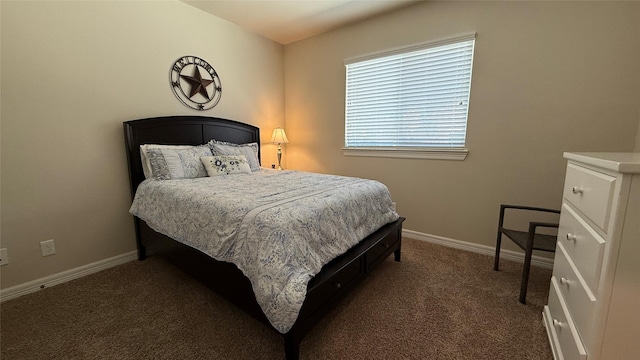 634 Carriage View Ln, Huffman, TX 77336 - carpeted bedroom with baseboards