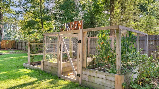 634 Carriage View Ln, Huffman, TX 77336 - view of yard with a vegetable garden