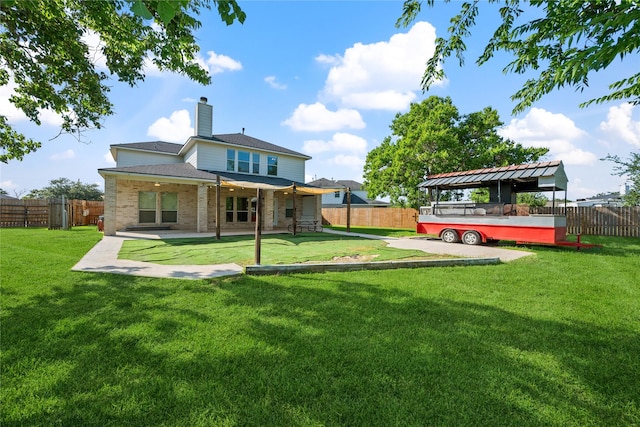 8002 Elm Wood Ct, Baytown, TX 77523 - back of property with a chimney, a patio, and brick siding