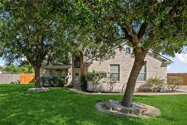 8002 Elm Wood Ct, Baytown, TX 77523 - obstructed view of property with brick siding