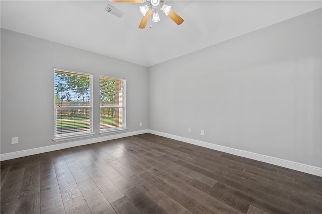 8002 Elm Wood Ct, Baytown, TX 77523 - empty room featuring ceiling fan, dark wood finished floors, lofted ceiling, and baseboards