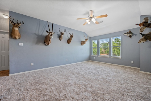 8002 Elm Wood Ct, Baytown, TX 77523 - unfurnished room featuring carpet, ceiling fan, baseboards, and lofted ceiling