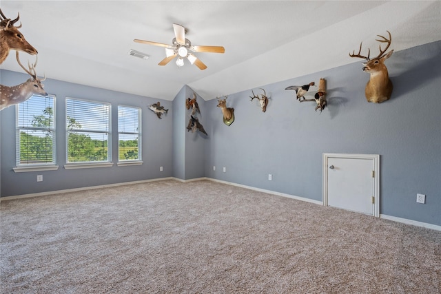 8002 Elm Wood Ct, Baytown, TX 77523 - additional living space featuring a ceiling fan, carpet, lofted ceiling, and baseboards