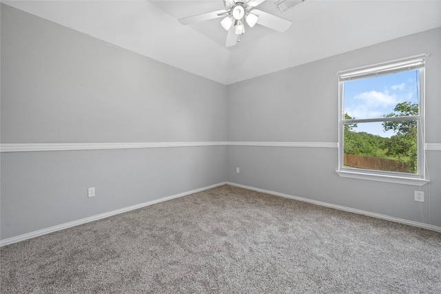 8002 Elm Wood Ct, Baytown, TX 77523 - carpeted empty room with a ceiling fan, baseboards, and vaulted ceiling