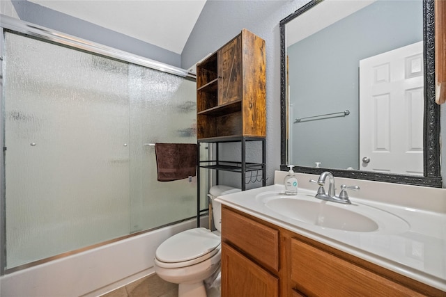 8002 Elm Wood Ct, Baytown, TX 77523 - bathroom with toilet, vanity, enclosed tub / shower combo, tile patterned flooring, and vaulted ceiling