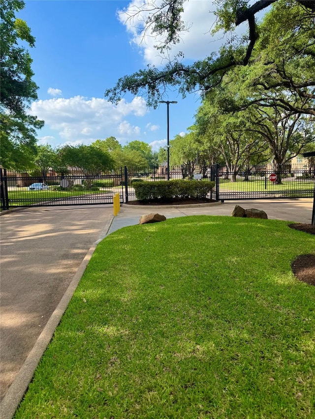 8007 E Oakwood Ct, Houston, TX 77040 - view of property's community with a gate