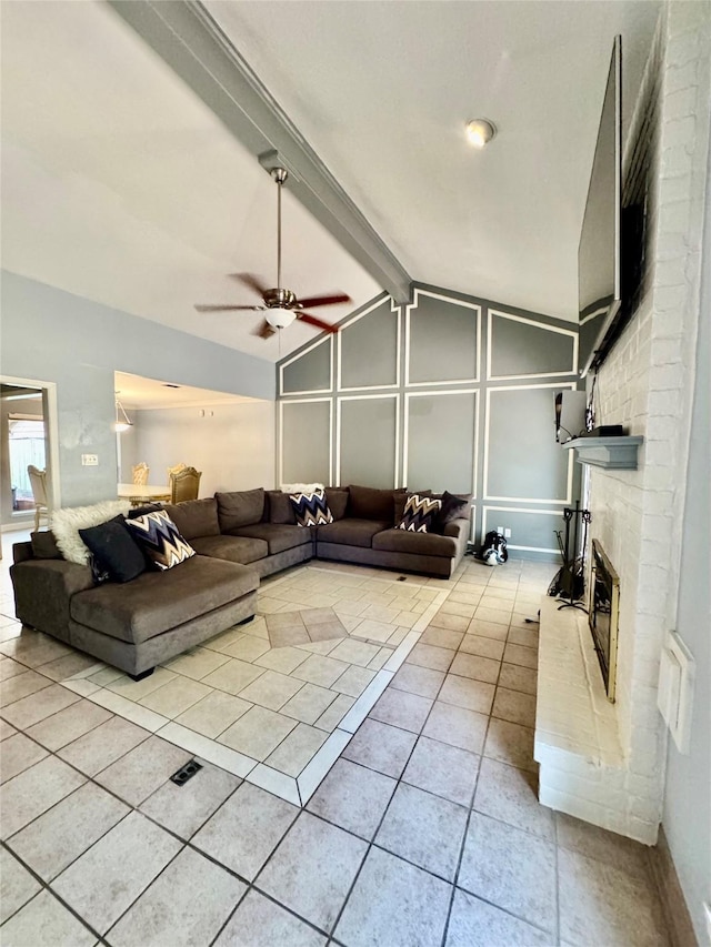 8007 E Oakwood Ct, Houston, TX 77040 - living area with ceiling fan, light tile patterned floors, and a fireplace